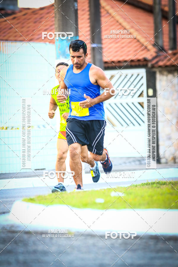 Buy your photos of the eventguia 13K Praia Grande on Fotop