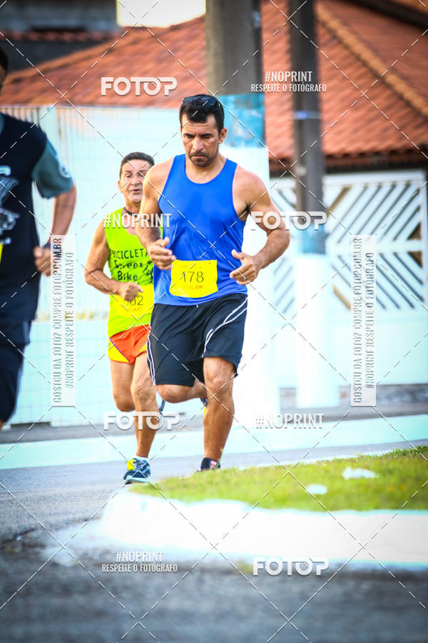 Buy your photos of the eventguia 13K Praia Grande on Fotop