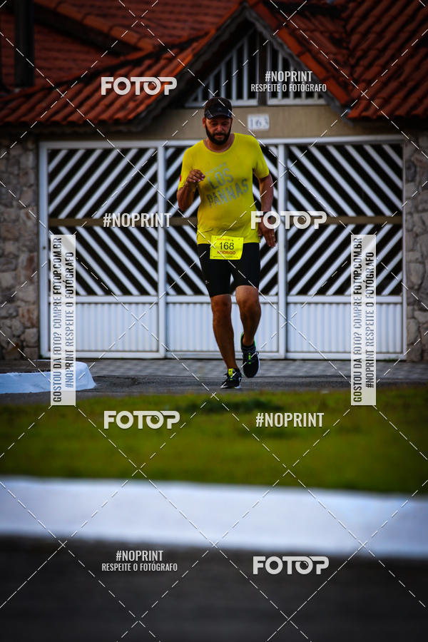 Buy your photos of the eventguia 13K Praia Grande on Fotop