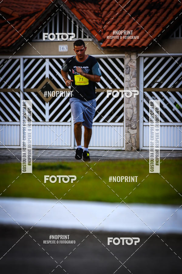 Buy your photos of the eventguia 13K Praia Grande on Fotop