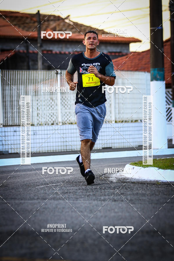 Buy your photos of the eventguia 13K Praia Grande on Fotop