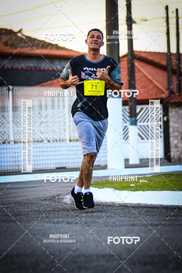 Buy your photos of the eventguia 13K Praia Grande on Fotop