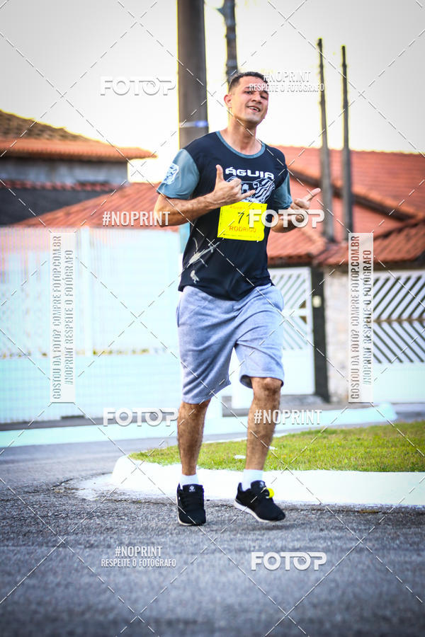 Buy your photos of the eventguia 13K Praia Grande on Fotop