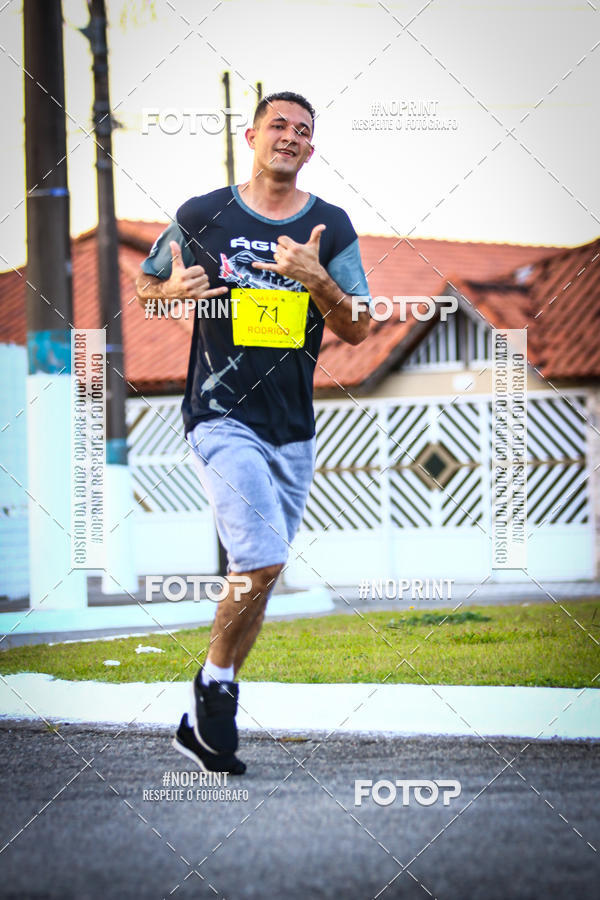 Buy your photos of the eventguia 13K Praia Grande on Fotop