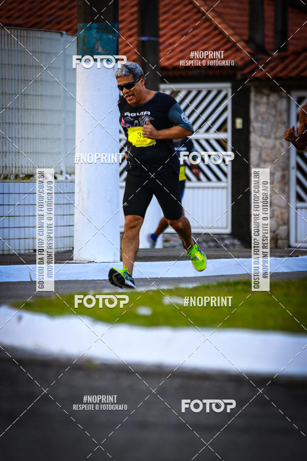 Buy your photos of the eventguia 13K Praia Grande on Fotop