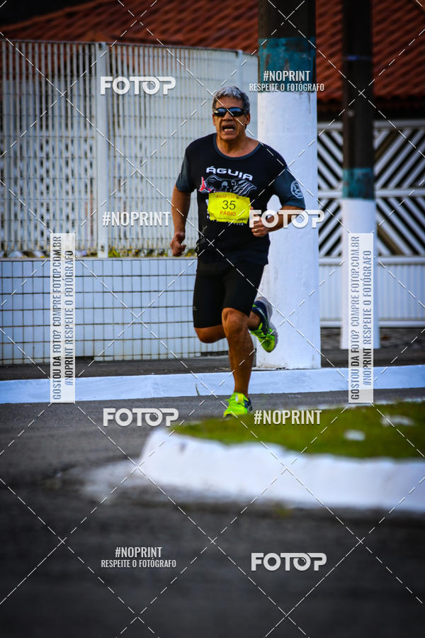Buy your photos of the eventguia 13K Praia Grande on Fotop