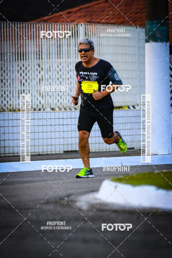 Buy your photos of the eventguia 13K Praia Grande on Fotop