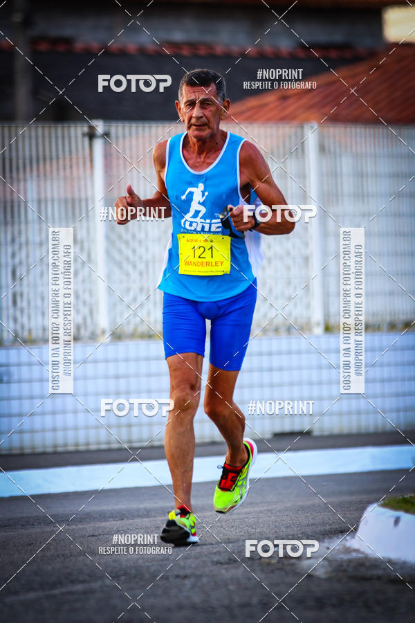 Buy your photos of the eventguia 13K Praia Grande on Fotop