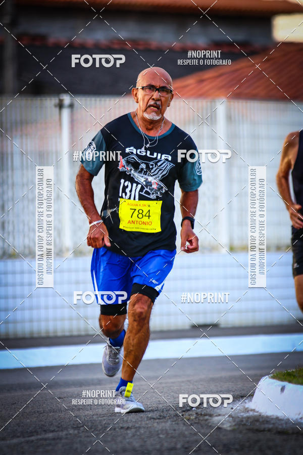 Buy your photos of the eventguia 13K Praia Grande on Fotop