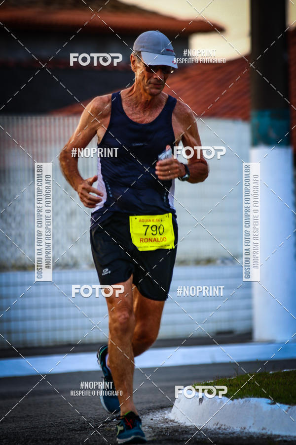 Buy your photos of the eventguia 13K Praia Grande on Fotop