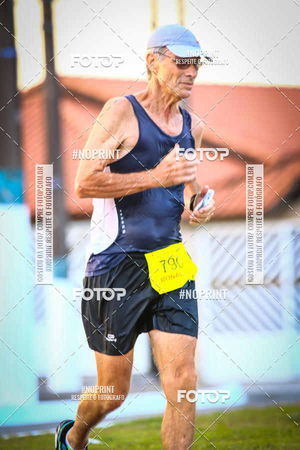 Buy your photos of the eventguia 13K Praia Grande on Fotop