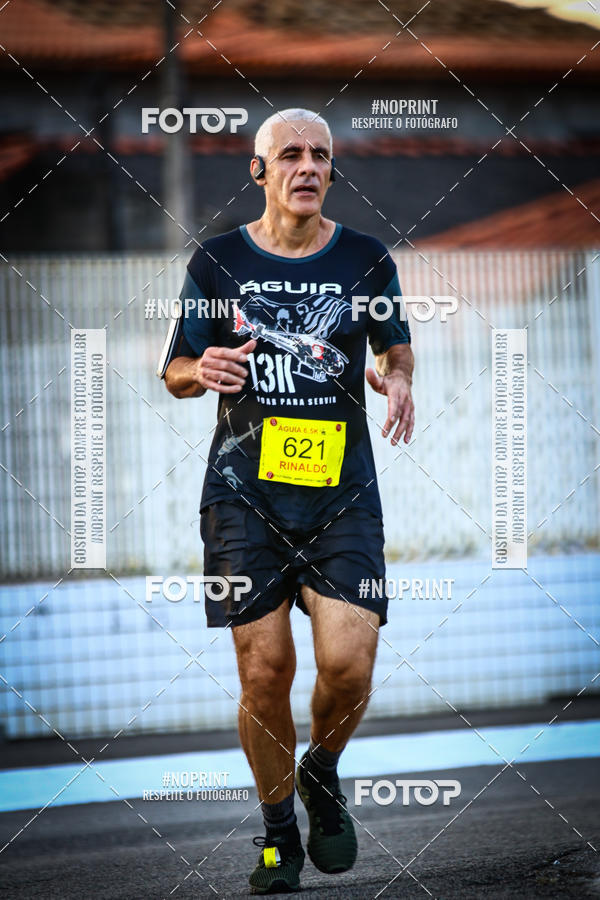 Buy your photos of the eventguia 13K Praia Grande on Fotop