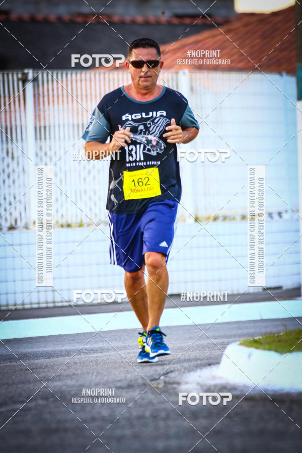 Buy your photos of the eventguia 13K Praia Grande on Fotop