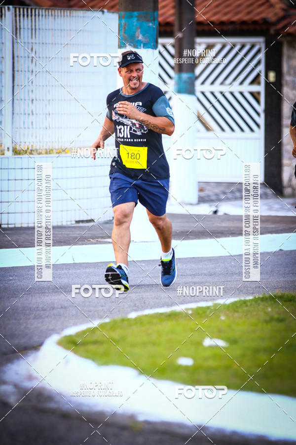 Buy your photos of the eventguia 13K Praia Grande on Fotop