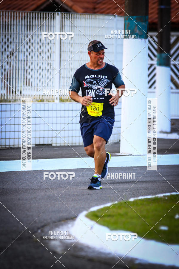 Buy your photos of the eventguia 13K Praia Grande on Fotop