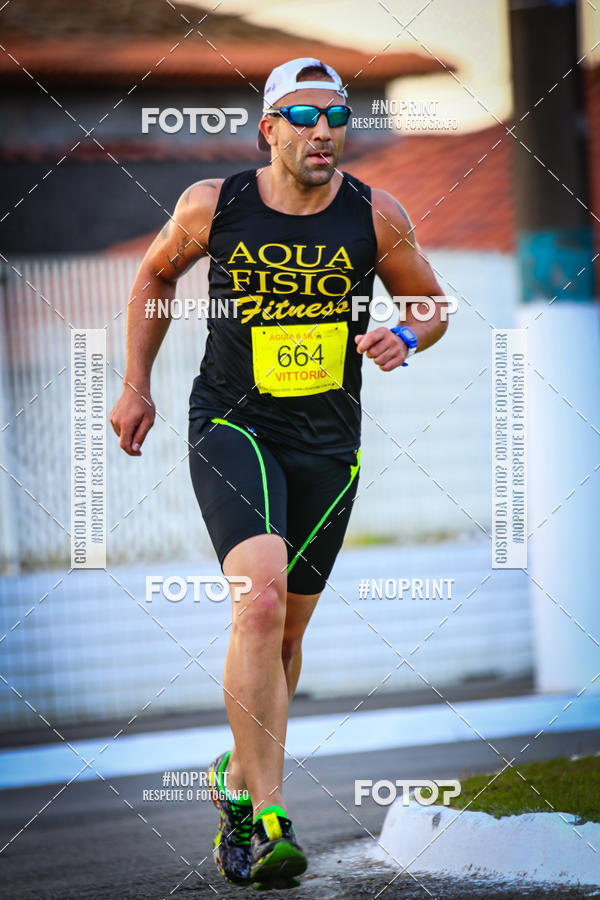 Buy your photos of the eventguia 13K Praia Grande on Fotop