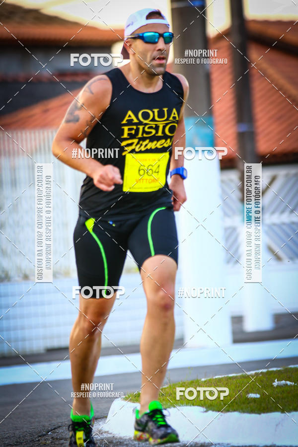 Buy your photos of the eventguia 13K Praia Grande on Fotop