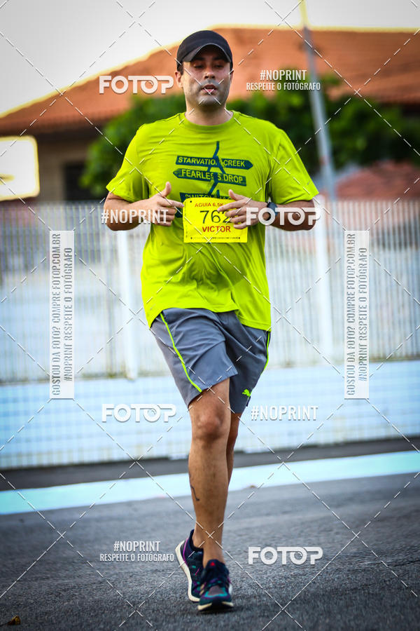 Buy your photos of the eventguia 13K Praia Grande on Fotop