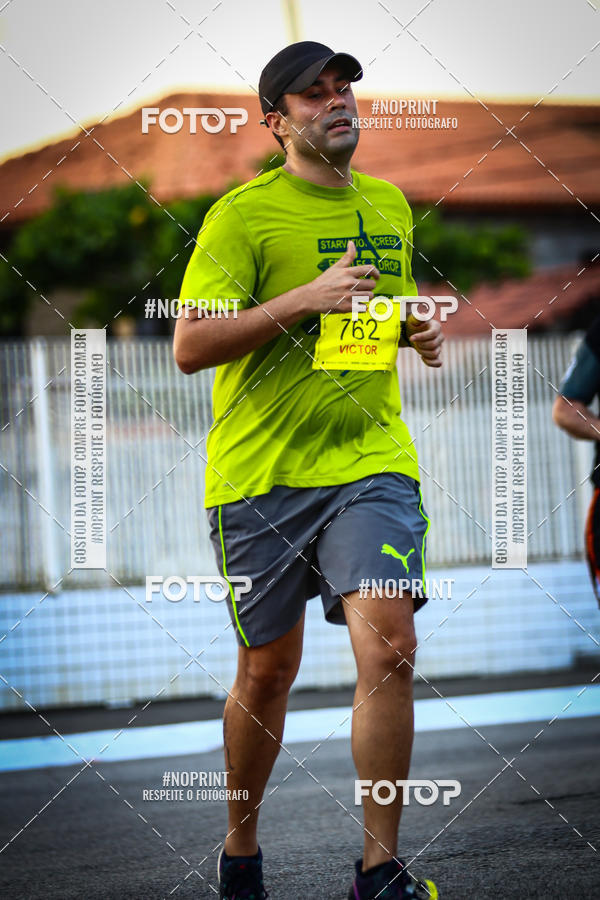 Buy your photos of the eventguia 13K Praia Grande on Fotop
