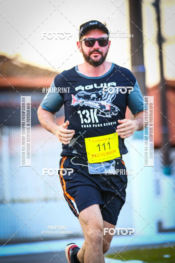 Buy your photos of the eventguia 13K Praia Grande on Fotop