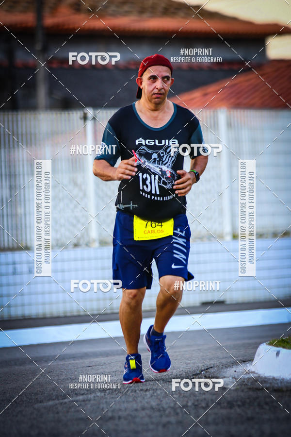 Buy your photos of the eventguia 13K Praia Grande on Fotop