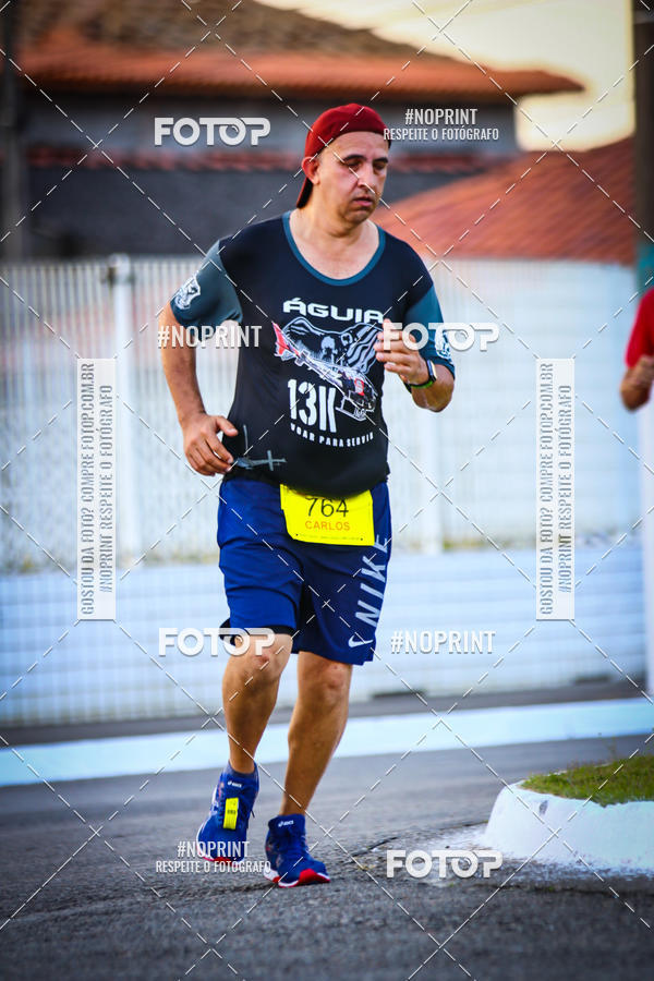 Buy your photos of the eventguia 13K Praia Grande on Fotop