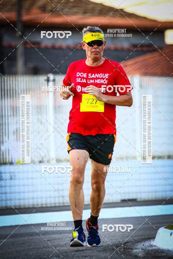 Buy your photos of the eventguia 13K Praia Grande on Fotop
