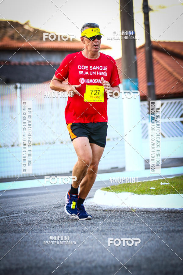 Buy your photos of the eventguia 13K Praia Grande on Fotop