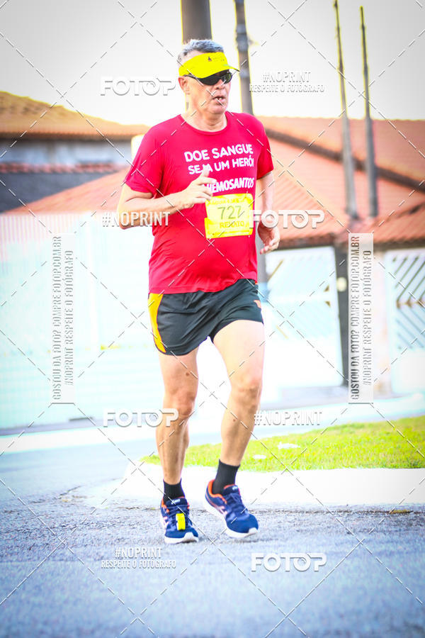 Buy your photos of the eventguia 13K Praia Grande on Fotop