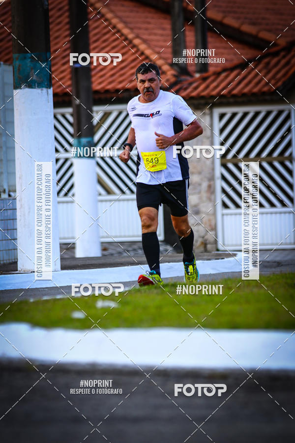 Buy your photos of the eventguia 13K Praia Grande on Fotop