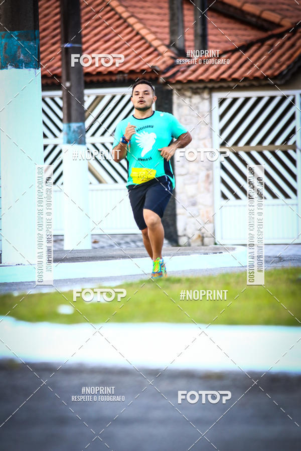 Buy your photos of the eventguia 13K Praia Grande on Fotop