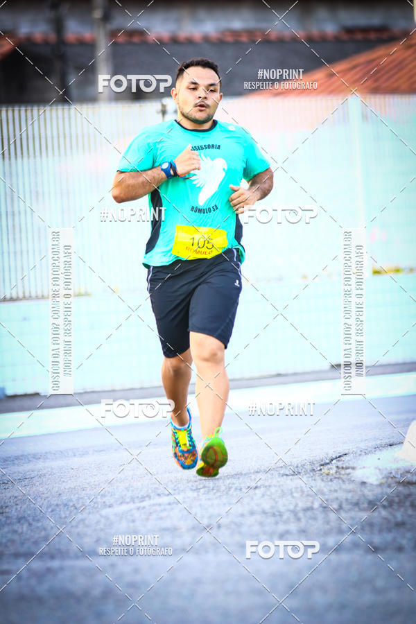 Buy your photos of the eventguia 13K Praia Grande on Fotop