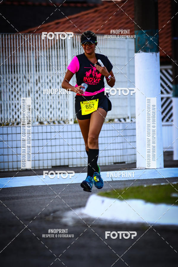 Buy your photos of the eventguia 13K Praia Grande on Fotop