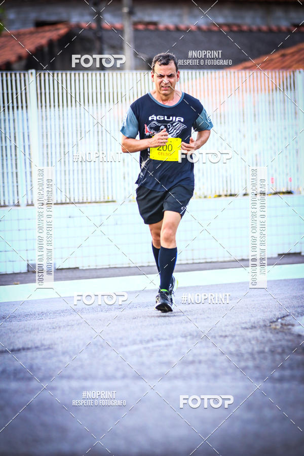 Buy your photos of the eventguia 13K Praia Grande on Fotop