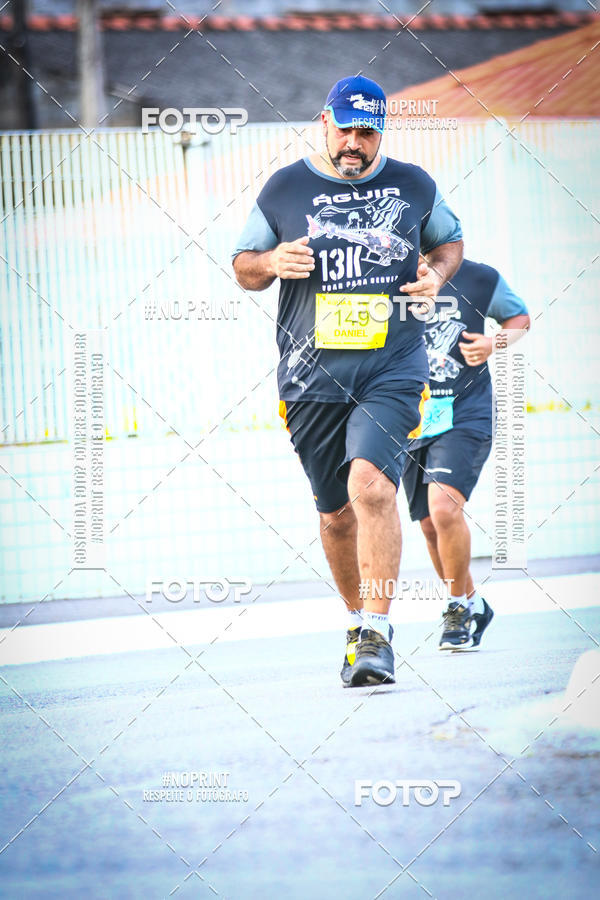 Buy your photos of the eventguia 13K Praia Grande on Fotop