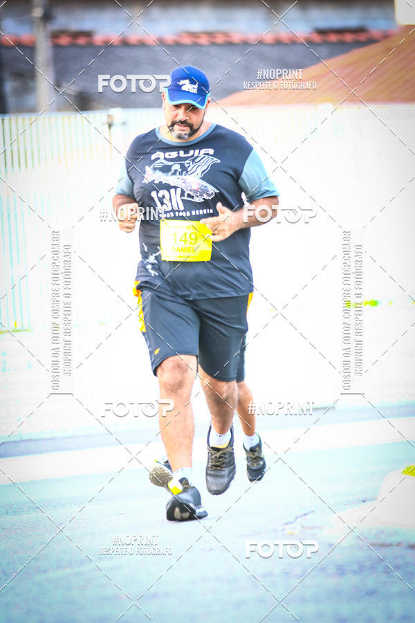 Buy your photos of the eventguia 13K Praia Grande on Fotop