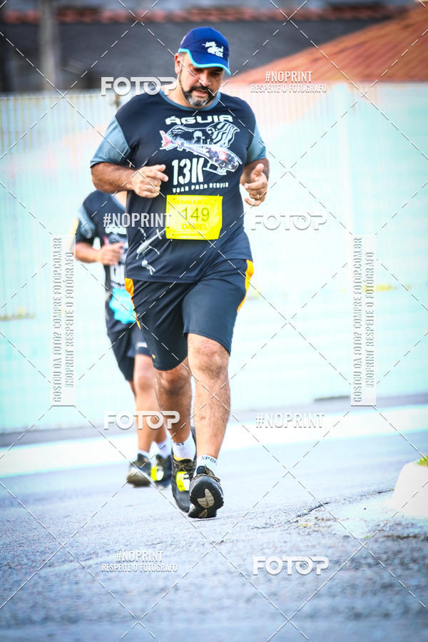 Buy your photos of the eventguia 13K Praia Grande on Fotop