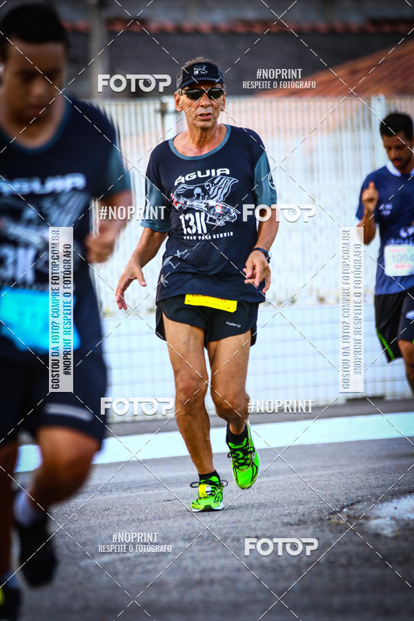 Buy your photos of the eventguia 13K Praia Grande on Fotop