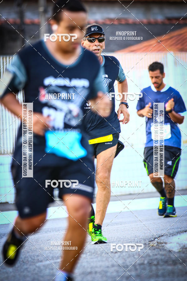 Buy your photos of the eventguia 13K Praia Grande on Fotop