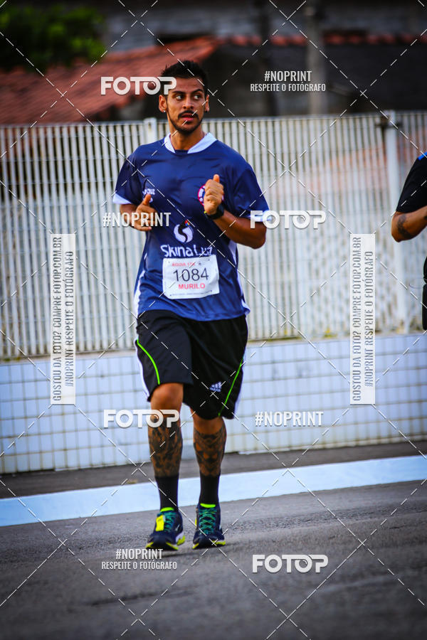 Buy your photos of the eventguia 13K Praia Grande on Fotop