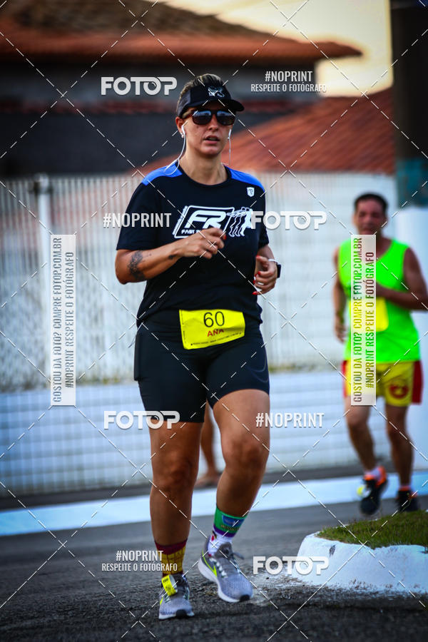 Buy your photos of the eventguia 13K Praia Grande on Fotop