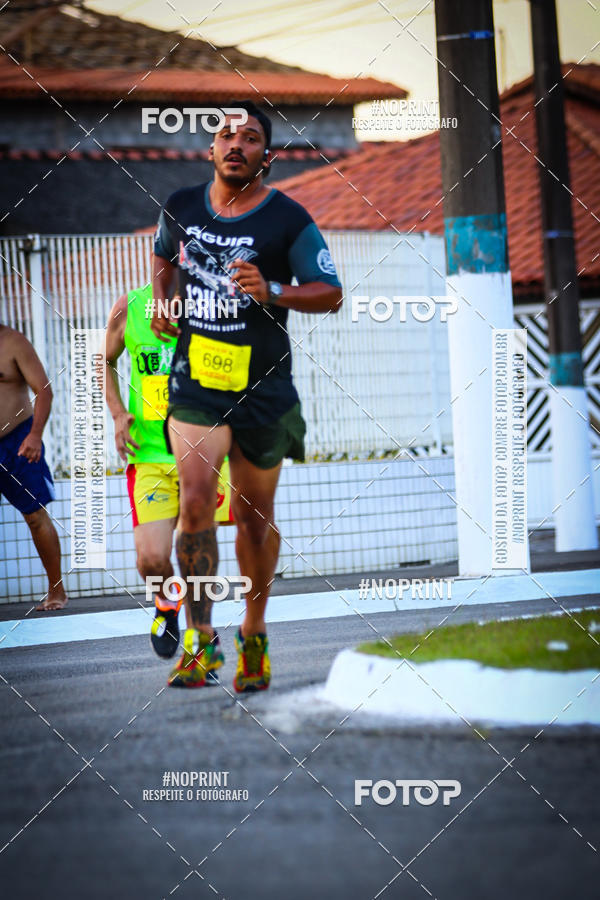 Buy your photos of the eventguia 13K Praia Grande on Fotop