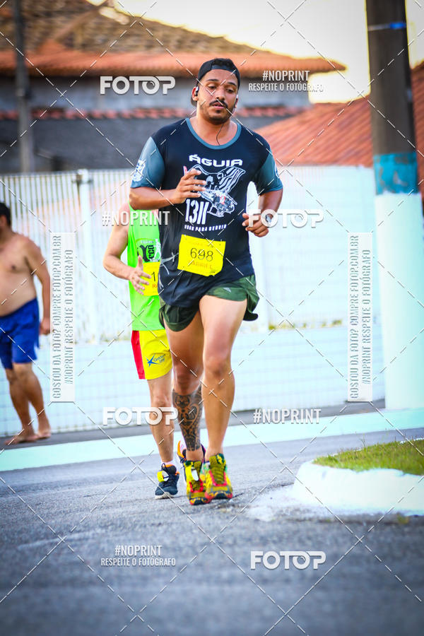 Buy your photos of the eventguia 13K Praia Grande on Fotop