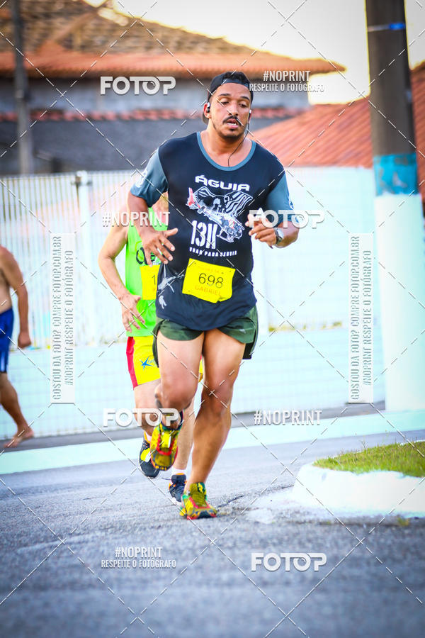 Buy your photos of the eventguia 13K Praia Grande on Fotop