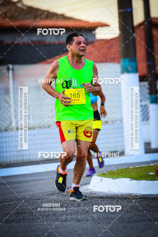 Buy your photos of the eventguia 13K Praia Grande on Fotop