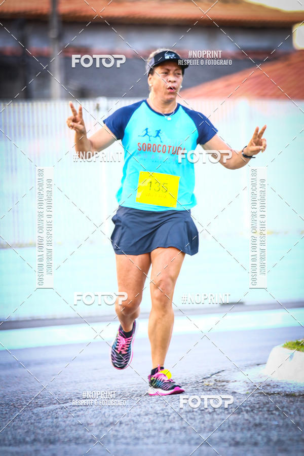 Buy your photos of the eventguia 13K Praia Grande on Fotop