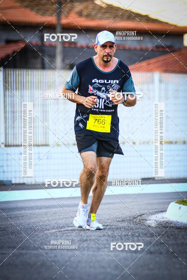 Buy your photos of the eventguia 13K Praia Grande on Fotop