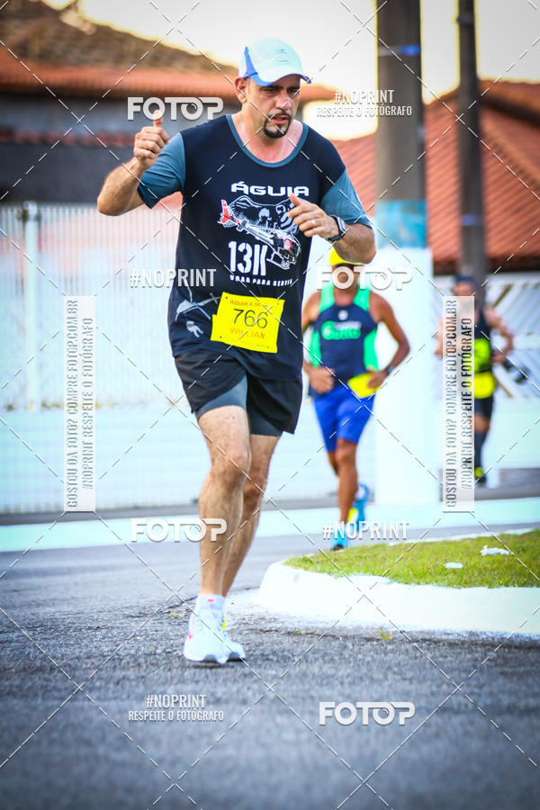Buy your photos of the eventguia 13K Praia Grande on Fotop
