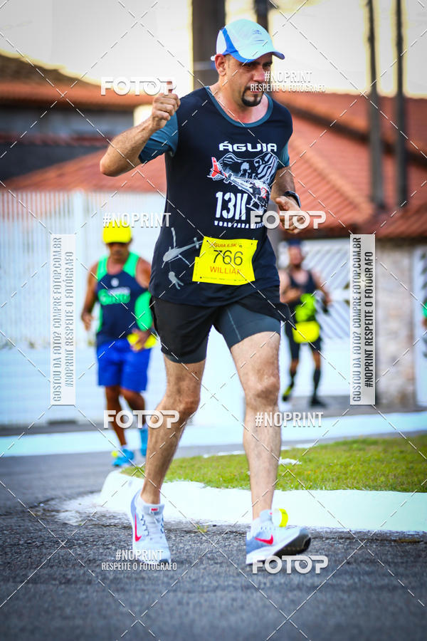 Buy your photos of the eventguia 13K Praia Grande on Fotop
