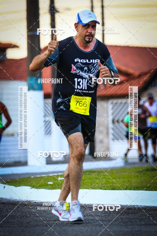Buy your photos of the eventguia 13K Praia Grande on Fotop